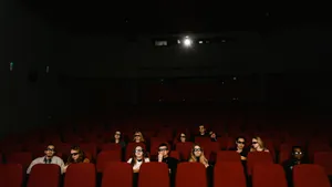 Moviegoers Wearing3 D Glasses Wallpaper