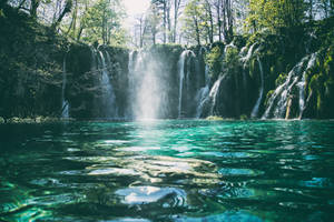 Moving Water From Waterfalls Wallpaper