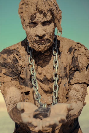 Muddy Man With Chain Wallpaper