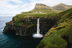 Mulafossur Waterfalls In Faroe Islands Wallpaper