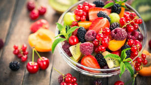 Mulberry Fruit Salad In A Bowl Wallpaper