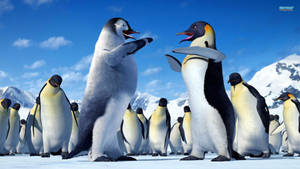 Mumble And Gloria Dancing Joyously - A Scene From Happy Feet Wallpaper