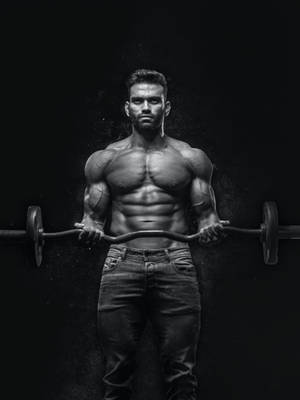 Muscular Man With Barbell Wallpaper