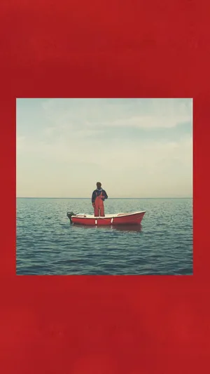 Music Artist Lil Yachty Poses In Front Of A Graffiti Mural Wallpaper
