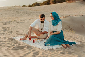 Muslim Couple At The Beach Wallpaper