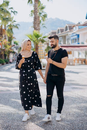 Muslim Couple With Ice Cream Wallpaper