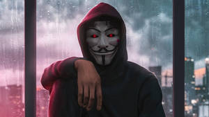 Mysterious Hacker In Mask – Unveiling Cyber Secrets During Rainy Night Wallpaper