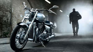 Mysterious Rider Leaving Motorcycle Wallpaper