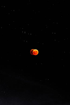 Mystical Lunar Connectivity - Two Red Phones On The Moon Wallpaper