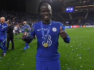N'golo Kante With Trophy And Medal Wallpaper