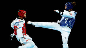 Nadin Dawani And Maryna Konieva Taekwondo London Olympic Wallpaper