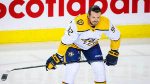 Nashville Predators' Ryan Johansen In Action, Awaiting The Puck Wallpaper