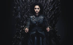 Nathalie Emmanuel Sitting On Throne Wallpaper