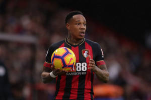 Nathaniel Clyne Holding A Ball Wallpaper