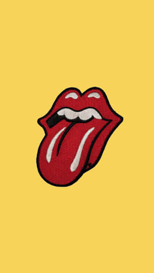 Naughty Tongue In Cool Yellow Background Wallpaper