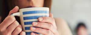 Nauseous Woman Holding Blue Mug Wallpaper