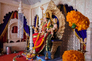Navratri Seated On Golden Throne Wallpaper