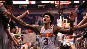 Nba All-star Kelly Oubre Jr. Getting Ready To Shoot A Three Pointer Wallpaper