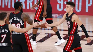 Nba Rookie Tyler Herro Shoots In A Packed Arena Wallpaper