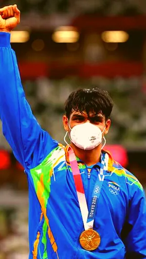 Neeraj Chopra Raises Fist Wallpaper