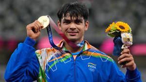 Neeraj Chopra With A Medal Wallpaper