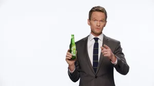 Neil Patrick Harris Smiles In The Spotlight Wallpaper