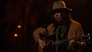 Neil Young, Pioneering Canadian Musician, Mesmerizing Performance With Acoustic Guitar Wallpaper