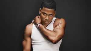 Nelly Showing His Signature