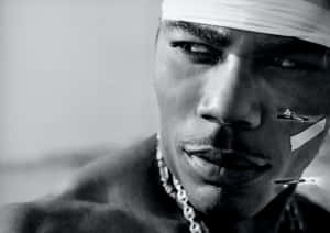 Nelly Thriving In The Spotlight Of His Career Wallpaper