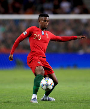 Nelson Semedo Flaunting Number 20 Football Jersey Wallpaper