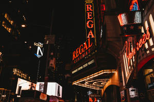 New York City Night View Of Regal Cinema Wallpaper