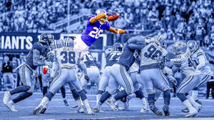 New York Giants Running Back Saquon Barkley Carrying The Ball Wallpaper