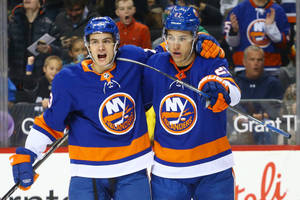 New York Islanders Anders Lee With Teammate Wallpaper