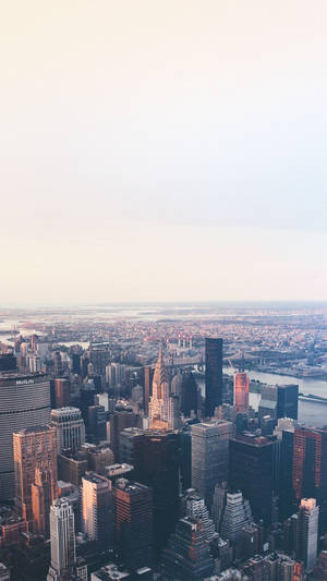 New York Skyline Iphone Underneath A Foggy Sky Wallpaper