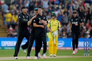 New Zealand Cricket Players Hugging Wallpaper