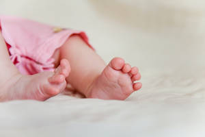 Newborn Baby Girl Pink Pajamas Wallpaper