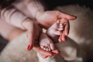Newborn Baby Girl Red Nails Wallpaper