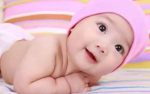Newborn Baby Pink Bonnet Wallpaper