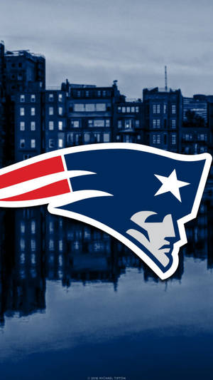 Nfl Patriots Logo With Building Background Wallpaper