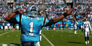 Nfl Star Cam Newton Throwing A Touchdown Wallpaper