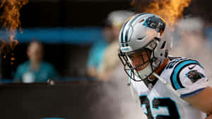 Nfl Star Christian Mccaffrey Prepares For The Next Game Wallpaper