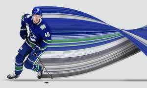 Nhl Player Elias Pettersson In Action Wallpaper