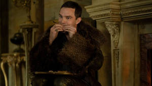 Nicholas Hoult Hungrily Eating Wallpaper