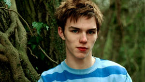 Nicholas Hoult In The Forest Wallpaper
