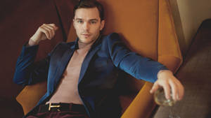 Nicholas Hoult On The Couch Wallpaper