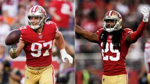 Nick Bosa Celebrates A Play On The Field Wallpaper