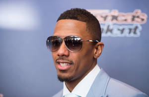 Nick Cannon Posing With Shades Wallpaper