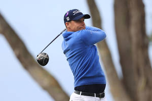 Nick Watney Preparing For A Shot At The Golf Tournament Wallpaper