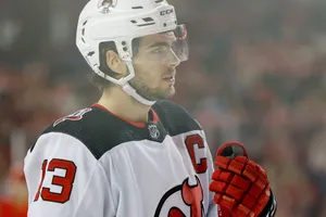 Nico Hischier Displaying Intensity On Ice Wallpaper