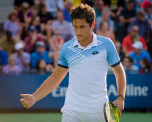 Nicolas Almagro Preparing For A Competitive Tennis Match Wallpaper